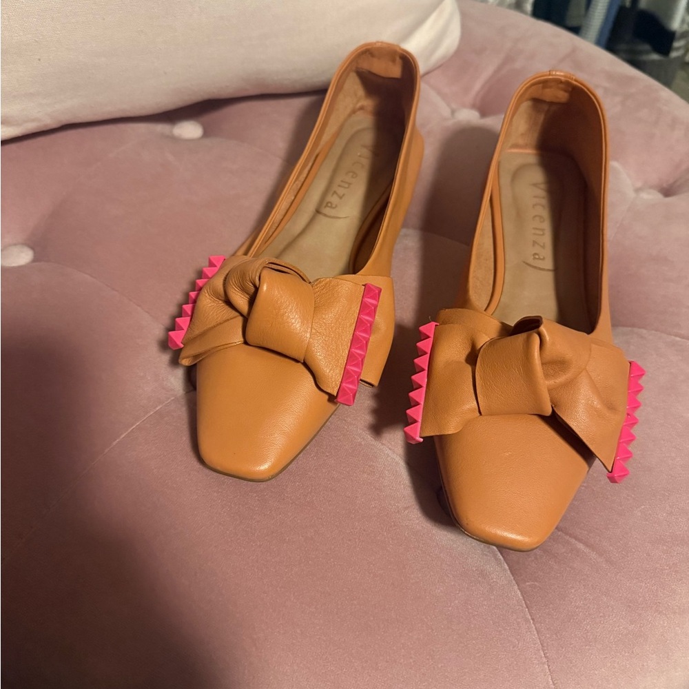 Stylish Vicenza Orange Flats with Pink Details